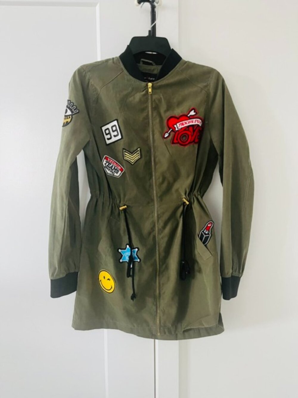 Military style but funny Ellie & Kate S with patches and gold zipper